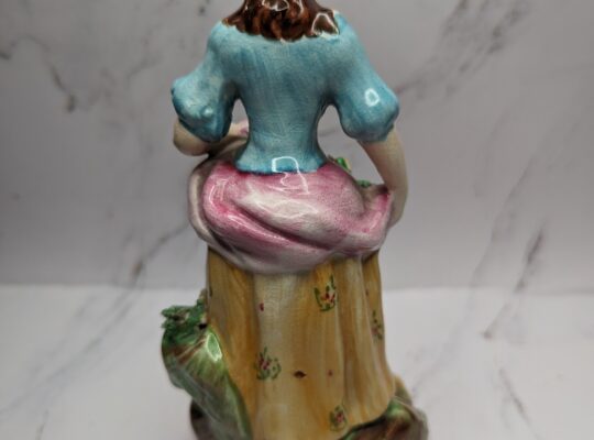 Women with flowers figure
