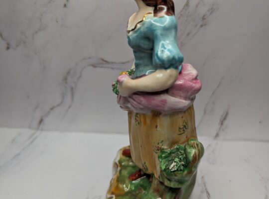 Women with flowers figure